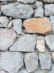 A creative backdrop made from a section of a natural stone fence