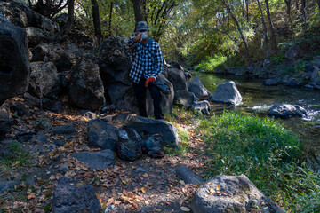 Eco Activist Man in Nature with Garbage Bags – Environmental Message Concept