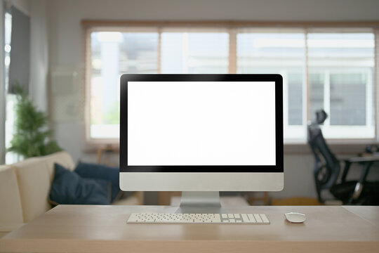 Home office setup featuring a clean desk monitor keyboard and workspace ambiance