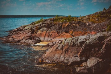 Rugged Rocky Shoreline by a Calm Lake
