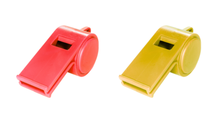 Two bright plastic whistles one red and one yellow, isolated on a transparent background for sports or safety use