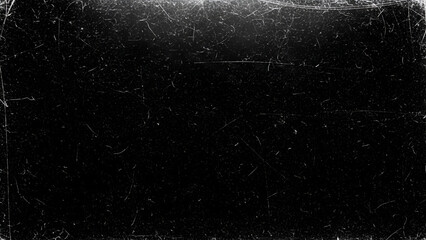 Dark background with abundant white scratches and dust