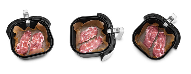 Raw pork neck slices placed in an air fryer basket lined with baking paper, isolated on a transparent background for cooking.