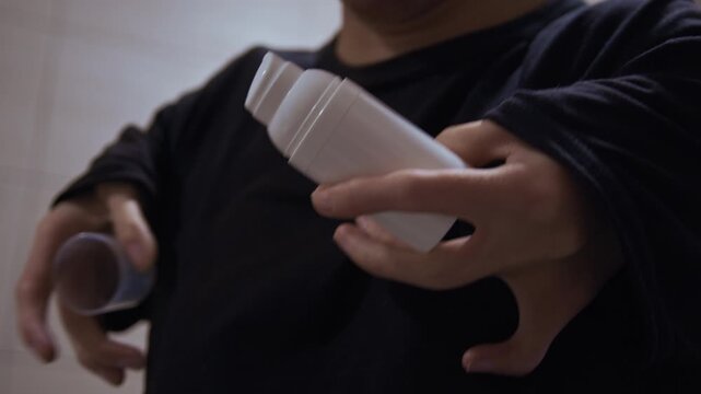 A person with a physical disability and problematic skin performs daily skincare in his home bathroom, promoting inclusivity and self-acceptance.