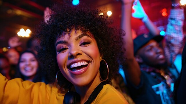 Woman dancing at nightclub.