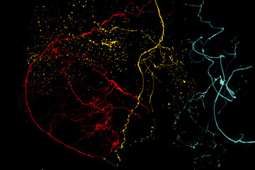 Colored paint splashes isolated on black background