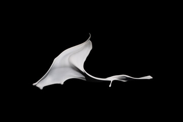 White paint splash isolated on black background.