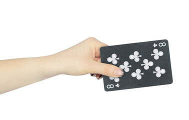 playing card clubs 8 in hand, outstretched hand with black playing card isolated from background