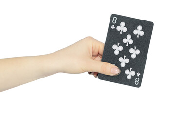 playing card clubs 8 in hand, outstretched hand with black playing card isolated from background