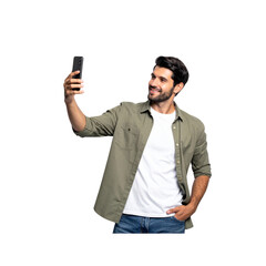A man taking a selfie with a smartphone isolated on a white background, wearing casual clothing, in a natural pose