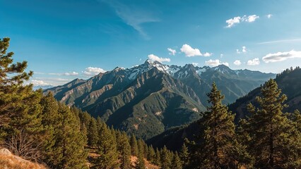 Obraz premium Mountain landscape with forest and sky, capturing the peaks and greenery of the mountains.
