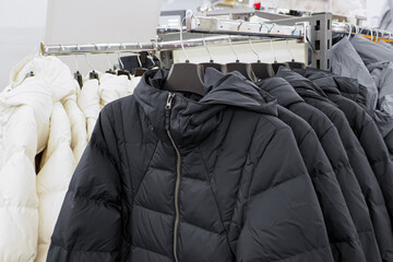 Coat. Casual sportswear. Clothing store. Textile industry. Consumerism