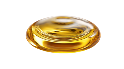 A closeup of golden liquid syrup on a white surface.