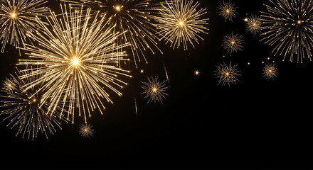 Golden fireworks exploding in a dark night sky
