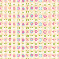 Seamless cute floral pattern with heart-centered blooms and green leaves in vertical rows on pastel yellow gingham—spring/nursery/Valentine background for fabric, gift wrap, and digital projects.