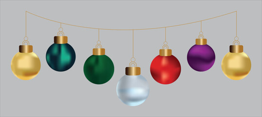 Colorful christmas balls hanging on a string for decoration and celebration