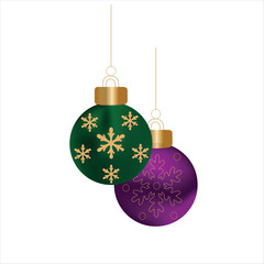Two christmas ornaments isolated on, one green and one purple