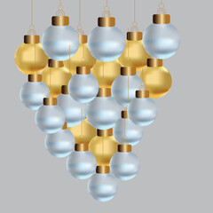 Elegant christmas decoration with gold and silver baubles on a gray background