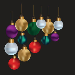 Colorful christmas balls hanging on strings against a dark brown background