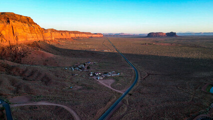 Sunset in semi-desert steppes with rock plateaus