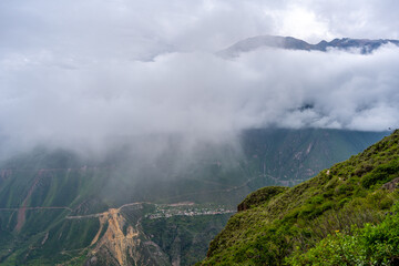 Colca Canyon in the mist and clouds, Peru
