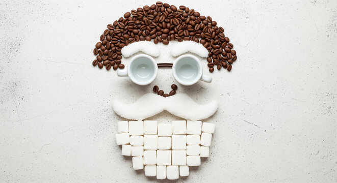 Coffee cups and beans arranged into a smiling face pattern with mini marshmallow mouth, creative food art for cafe design or breakfast menu.