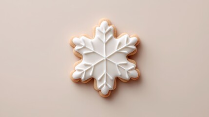 White cookie shaped like a snowflake