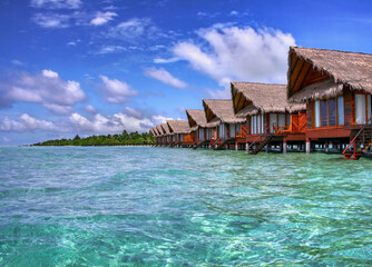 Tropical landscape of Hudhuranfushi island in the Maldives. Indian Ocean