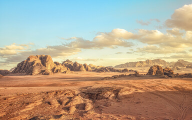 Wadi Rum desert landscape lit by moody afternoon sunset light - location similar to planet surface, used in many science fiction movies