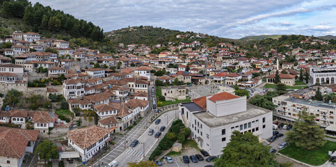 Aerial view of Berat&rsquo;s Gorica and Mangalem quarters, showcasing hillside homes, stone streets, and classic Albanian architecture.