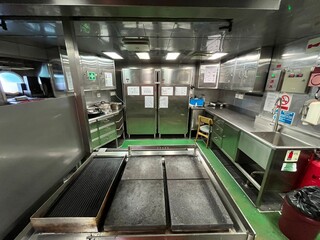 A galley on board of the offshore support vessel. It is clean and tidy