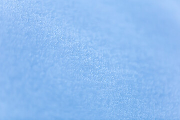 Blue snow surface, background, texture.
