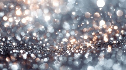 Silver sparkling lights festive background with soft textured glow, abstract christmas twinkling bokeh and gentle falling stars creating a bright winter holiday card or elegant seasonal invitation des