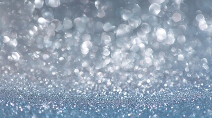 White and light blue glitter bokeh background with soft sparkling light particles for elegant, festive, and luxury design projects, creating a shimmering abstract texture for invitations, holiday deco