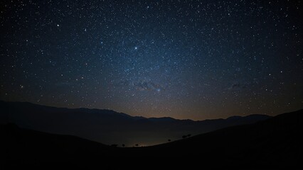 Dark night sky with stars over mountain landscape. Astronomy and space concept. The beauty of the night sky. Clear sky and celestial bodies. The universe and cosmic scenery.