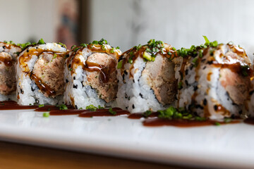 Sushi rolls displaying fresh fish and rice
