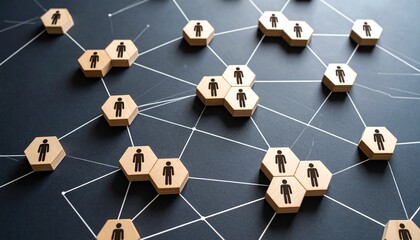 Connected wooden tiles with person icons forming a network on dark surface.