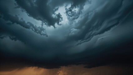 Dark storm clouds overhead with a hint of sunset glow below.
