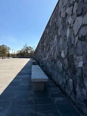 old stone wall with blue sky