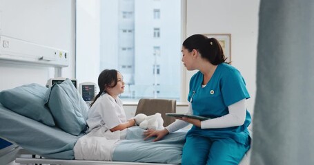 Doctor, child and tablet in hospital bed, discussion or happy for wellness report for recovery. Pediatrician, girl and toy bear with app, listen and talk with feedback for rehabilitation at clinic - Powered by Adobe
