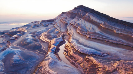 Abstract mineral plateau with rare earth crystals, metallic veins, detailed rock textures, soft natural lighting, and serene outdoor environment