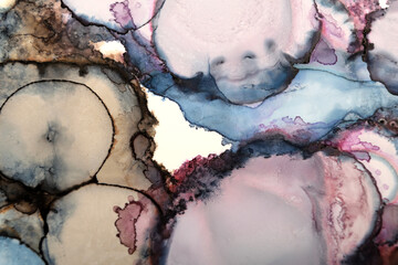 Ink stain art background in purple and blue