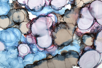 Ink stain art background in purple and blue