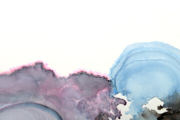 Ink stain art background in purple and blue