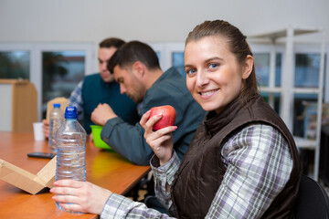 portrait of factory workers having a break
