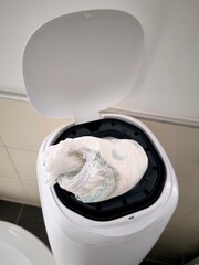 Close-up of a container for recycling and disposal of used diapers