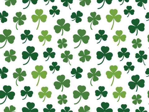 A repeating pattern of green shamrocks and clovers on a white background