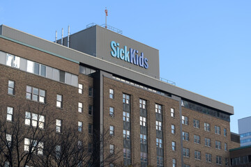 Fototapeta premium facade and sign of The Hospital for Sick Children, University Av side, Toronto