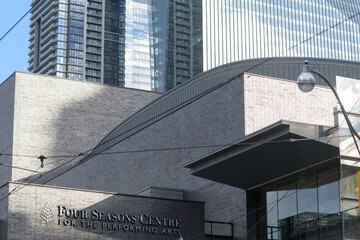 Fototapeta premium exterior building facade and sign of Four Seasons Centre for the Performing Arts located at 145 Queen St W, Toronto