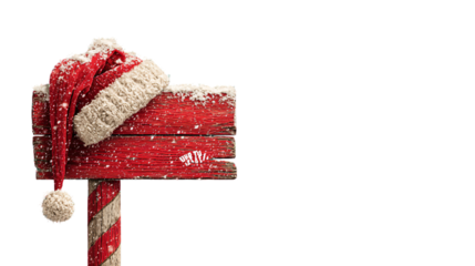 Santa hat and snowy red wooden signpost with festive pole